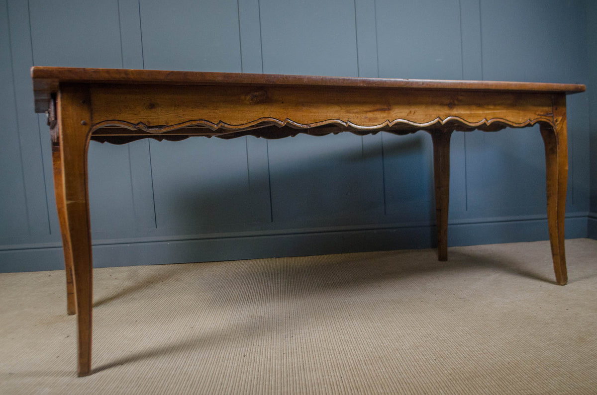 
Antique French farmhouse table with planked cherry wood top