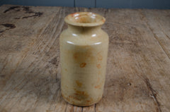 Rustic cream glazed antique ink bottle with aged patina