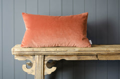 rust velvet oblong cushion