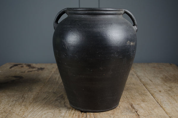 Hand thrown wood fired black clay pot