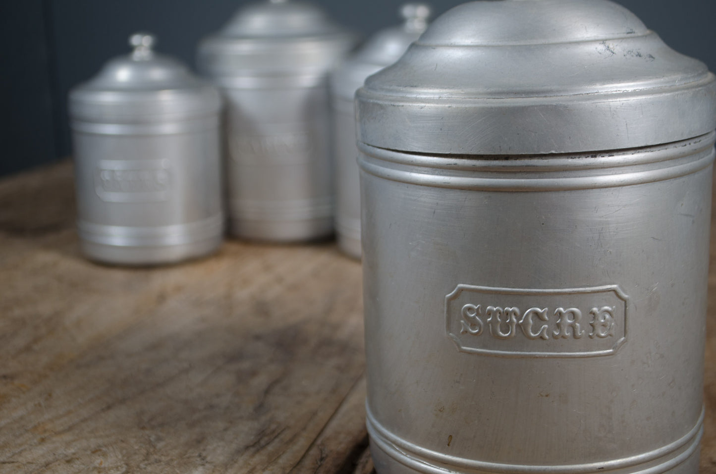 Decorative French pantry canisters with embossed lettering