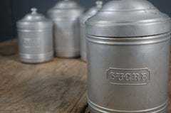 Decorative French pantry canisters with embossed lettering