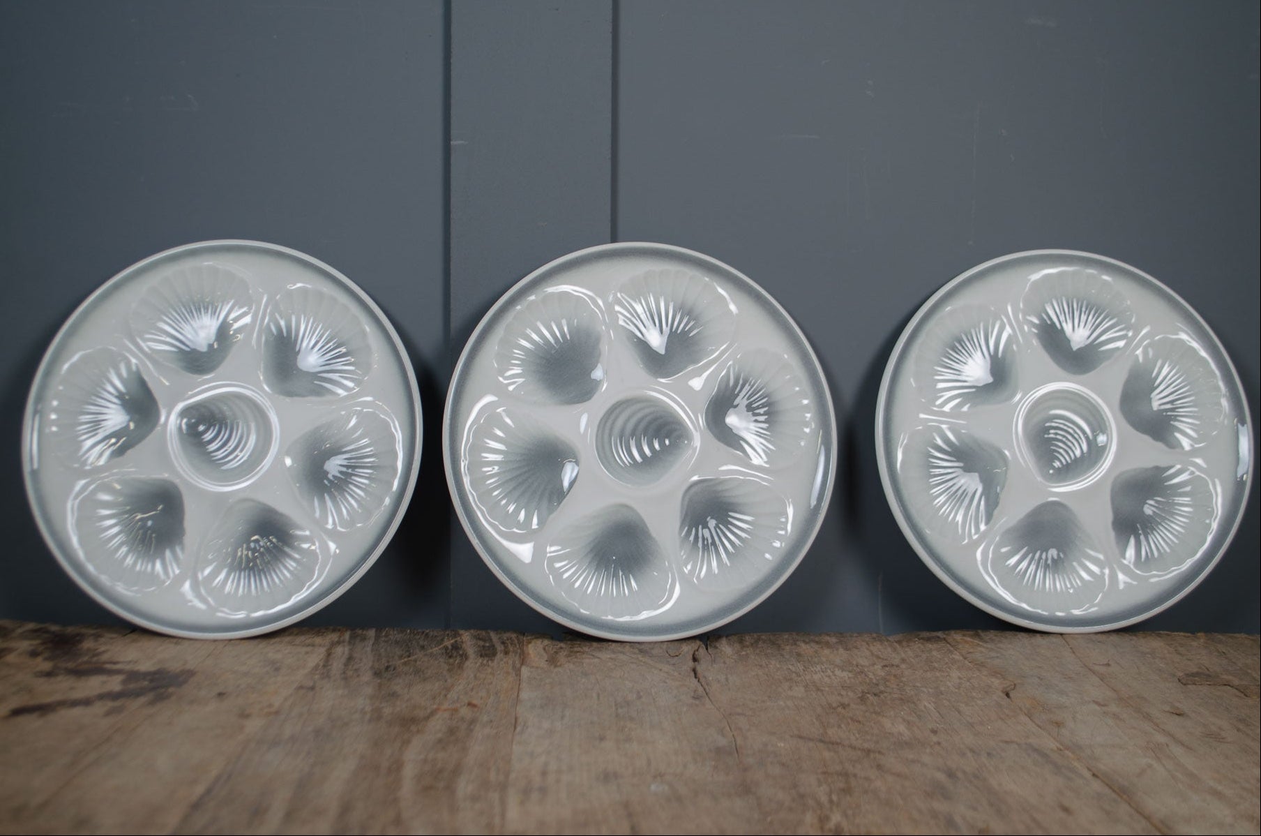 
Vintage French oyster plate with shell shaped wells