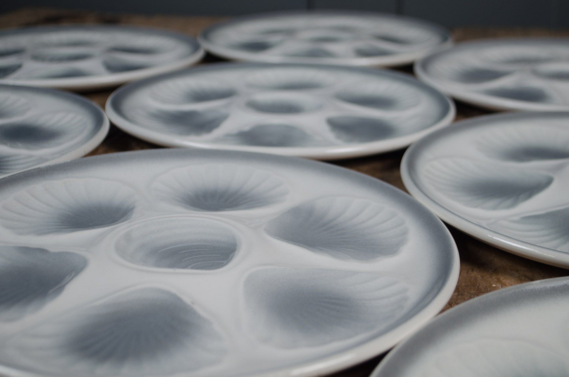 
Pale grey ceramic oyster serving plate from France