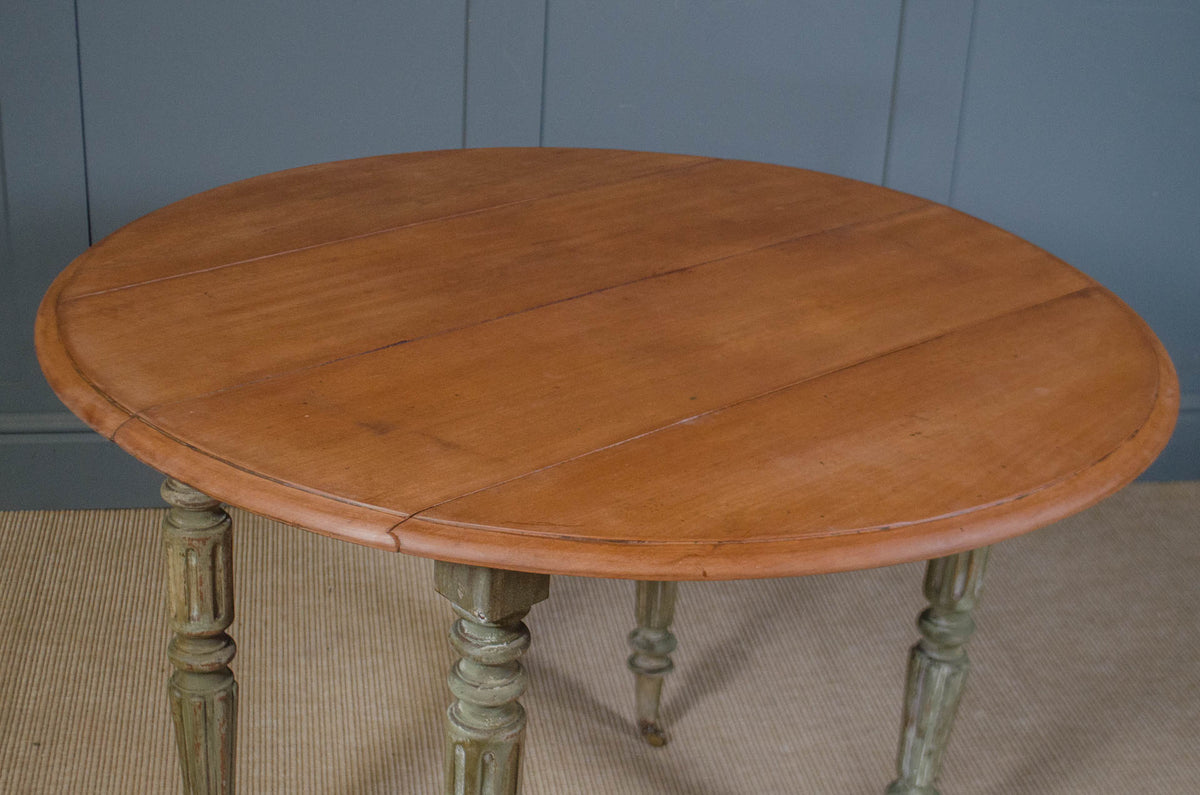 
Round wooden space saving kitchen table