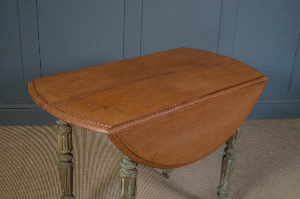 
French folding dining table with warm natural wood top