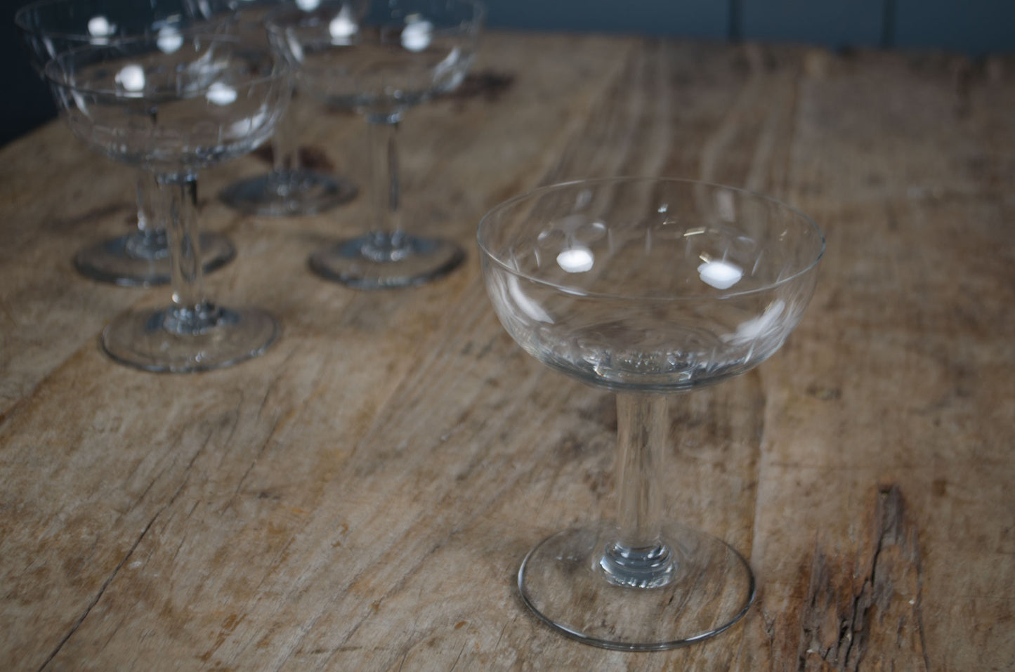 Elegant French coupe glasses with etched detailing
