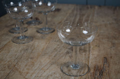 Elegant French coupe glasses with etched detailing