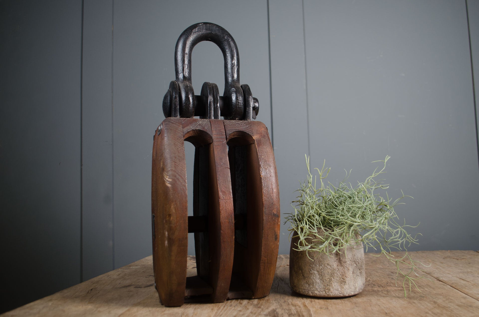 Large vintage wooden block pulley with iron hook