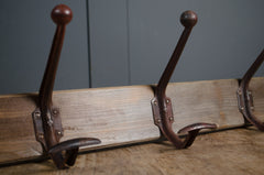 antique metal and wood coat hook
