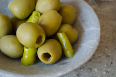 olives in rustic bowl