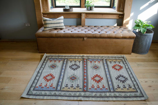 weaver green kilim rug