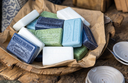 Set of three French organic soap bars with illustrated wrapping